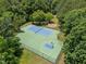 Aerial of outdoor sports courts featuring tennis, and basketball, providing recreation for residents at 3007 Appling Way, Durham, NC 27703