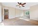 Spacious bedroom with a ceiling fan and a window providing natural light at 306 Neuse Ridge Dr, Clayton, NC 27527