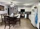 Kitchen and dining area featuring granite countertops and stainless steel appliances at 3129 Skycrest Dr, Raleigh, NC 27604