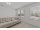 Well-lit bedroom with neutral walls, carpet flooring, and large windows offering natural light at 319 Great Northern Station Sta, Apex, NC 27502