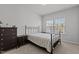 Bedroom with neutral decor and carpet and a large window at 319 Great Northern Station Sta, Apex, NC 27502