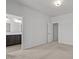 Bedroom with a doorway to the bathroom and plenty of natural light at 319 Great Northern Station Sta, Apex, NC 27502