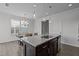 Spacious kitchen with a center island, stainless steel appliances and adjacent dining area at 319 Great Northern Station Sta, Apex, NC 27502