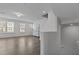 Spacious living room featuring hardwood floors, bright windows, and ample room for seating at 319 Great Northern Station Sta, Apex, NC 27502