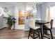 Charming dining area with stylish chandelier, adjacent to the kitchen, perfect for Gathering meals at 320 Gilman Ln # 106, Raleigh, NC 27610