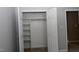 Spacious closet with rod and shelves, perfect for organizing clothes and accessories at 3209 Leebrook Rd, Raleigh, NC 27616