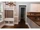 Charming breakfast nook with built-in bench seating, storage cubbies, and open flow to the kitchen at 3209 Leebrook Rd, Raleigh, NC 27616