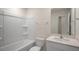 This bathroom has standard fixtures with a shower, toilet and sink at 416 Ember St, Sanford, NC 27330