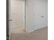 This bedroom offers an ample closet and neutral-colored walls and flooring at 416 Ember St, Sanford, NC 27330