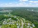 A well-planned neighborhood surrounded by mature trees, blending community living with natural beauty and scenery at 518 Clearfield Dr, Durham, NC 27703