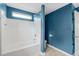 This bathroom has a white tiled shower and commode at 518 Clearfield Dr, Durham, NC 27703