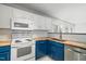 Stylish kitchen featuring stainless steel appliances, butcher block counters, and subway tile backsplash at 518 Clearfield Dr, Durham, NC 27703