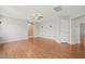 Inviting living room featuring hardwood floors, a ceiling fan, and a neutral color palette at 518 Clearfield Dr, Durham, NC 27703