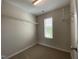 Walk-in closet with a window and shelving at 545 Writers Way, Morrisville, NC 27560