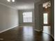 Dining room with hardwood floors, white trim, and chandelier lighting at 545 Writers Way, Morrisville, NC 27560
