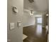 Spacious living room with wood-look floors, neutral walls, and a ceiling fan at 545 Writers Way, Morrisville, NC 27560