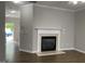 Spacious living room with fireplace and hardwood flooring at 545 Writers Way, Morrisville, NC 27560