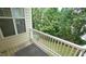Balcony view with privacy from the green trees surrounding the property at 5916 Longeria Ct, Raleigh, NC 27612
