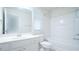 Bright bathroom with tub shower combo, and modern vanity at 5916 Longeria Ct, Raleigh, NC 27612
