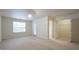 Large bedroom with walk-in closet and outdoor access at 5916 Longeria Ct, Raleigh, NC 27612