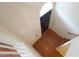 Hallway featuring staircase, storage closet and front door at 5916 Longeria Ct, Raleigh, NC 27612