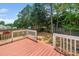 Spacious backyard deck with white railings, ideal for outdoor entertaining at 612 Agin Court Pl, Clayton, NC 27520