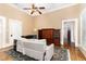 Comfortable living room boasts hardwood floors, high ceilings, a ceiling fan, and ample natural light at 6200 Us-401 S, Bunnlevel, NC 28323