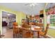 Open dining area connected to the kitchen, featuring a breakfast nook and ample counter space at 6408 Glen Brack Ct, Raleigh, NC 27603