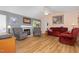 Cozy living room with vaulted ceilings, fireplace, and comfortable seating at 6408 Glen Brack Ct, Raleigh, NC 27603