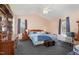 Comfortable main bedroom with vaulted ceilings, large windows, and a calm color palette at 6408 Glen Brack Ct, Raleigh, NC 27603