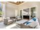 Sunroom with a wood plank ceiling, tile floor and wicker furniture set at 6900 Staghorn Ln, Raleigh, NC 27615