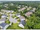 Overview of the neighborhood featuring well-maintained homes, tree-lined streets, and community layout at 7502 Latteri Ct, Raleigh, NC 27613