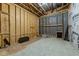 Unfinished basement ready for customization, with wooden framing and a concrete floor at 7502 Latteri Ct, Raleigh, NC 27613