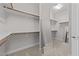 Walk-in closet with ample shelving and storage space at 7502 Latteri Ct, Raleigh, NC 27613