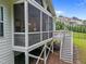 Underneath the house screened porch featuring stairs and a view of the backyard at 7502 Latteri Ct, Raleigh, NC 27613