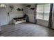 Entryway featuring a bench, coat hooks, and a window with blinds at 78 Phil Johnson Rd, Sanford, NC 27330
