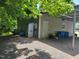 Exterior of metal outbuilding with lean-to, gravel, and storage at 78 Phil Johnson Rd, Sanford, NC 27330