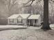 Charming single story home exterior covered in snow at 78 Phil Johnson Rd, Sanford, NC 27330