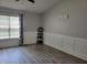 Living room featuring decor on the wall and a large window at 78 Phil Johnson Rd, Sanford, NC 27330