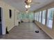 Sunroom with lots of windows, hardwood floors, and natural lighting at 78 Phil Johnson Rd, Sanford, NC 27330