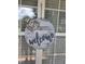 Welcome sign hanging on the front door, enhancing curb appeal at 78 Phil Johnson Rd, Sanford, NC 27330