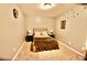 Charming bedroom with neutral walls, a comfortable bed, and decorative polka dots adding a playful touch at 83 Mariners Point Way, Garner, NC 27529