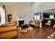 Cozy living room with high ceilings, fireplace and hardwood flooring at 83 Mariners Point Way, Garner, NC 27529