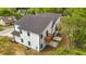 Two-story home with a modern exterior, attached decks, and new landscaping at 834-836 Day Ave, Burlington, NC 27217