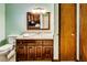 Bathroom vanity with wooden cabinets and granite countertops at 835 Pearleman Teague Rd, Siler City, NC 27344