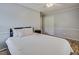 Bedroom featuring light gray walls, wood floors, and a closet at 835 Pearleman Teague Rd, Siler City, NC 27344