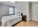 Bedroom with light gray walls, wood flooring, and ceiling fan at 835 Pearleman Teague Rd, Siler City, NC 27344