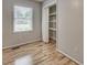 Bedroom with wood flooring and built in closet at 835 Pearleman Teague Rd, Siler City, NC 27344
