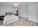 Comfortable bedroom with ensuite bath, featuring a ceiling fan, and a neutral color palette at 835 Pearleman Teague Rd, Siler City, NC 27344