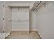 Walk-in closet with carpet flooring, rod and shelf, offering ample storage at 835 Pearleman Teague Rd, Siler City, NC 27344
